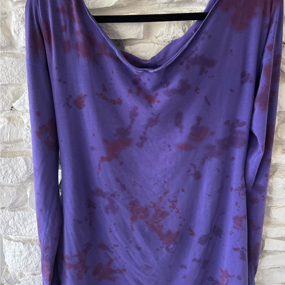 Nancy Rose Performance Purple Long Sleeve Tee. Thumbholes and open back detail.